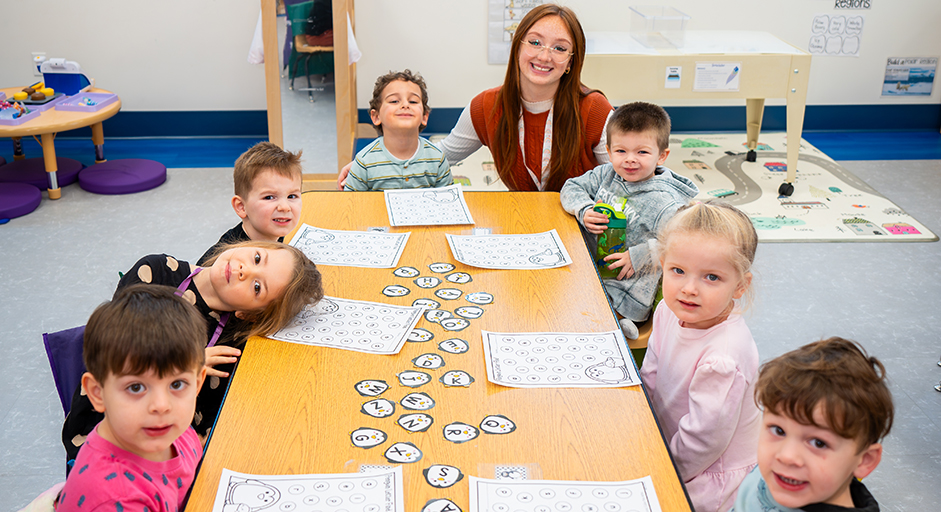 Image of Children with teacher in the Jellyfish room