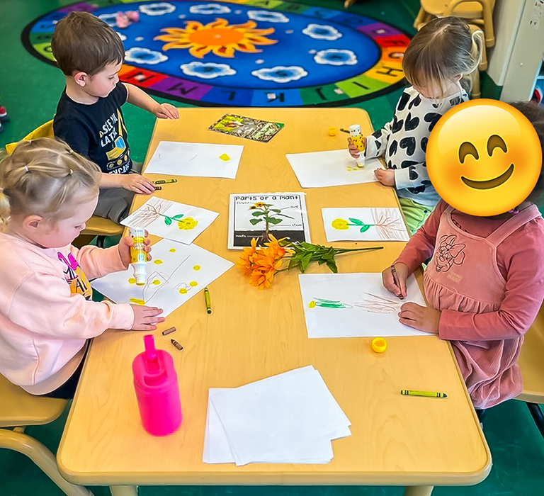 Image of kids playing in sensory bin