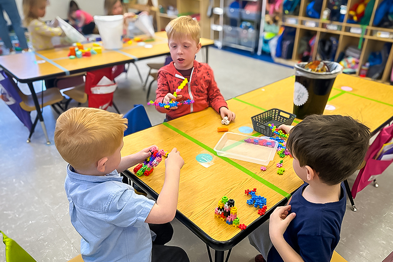 Image of kids playing in sensory bin